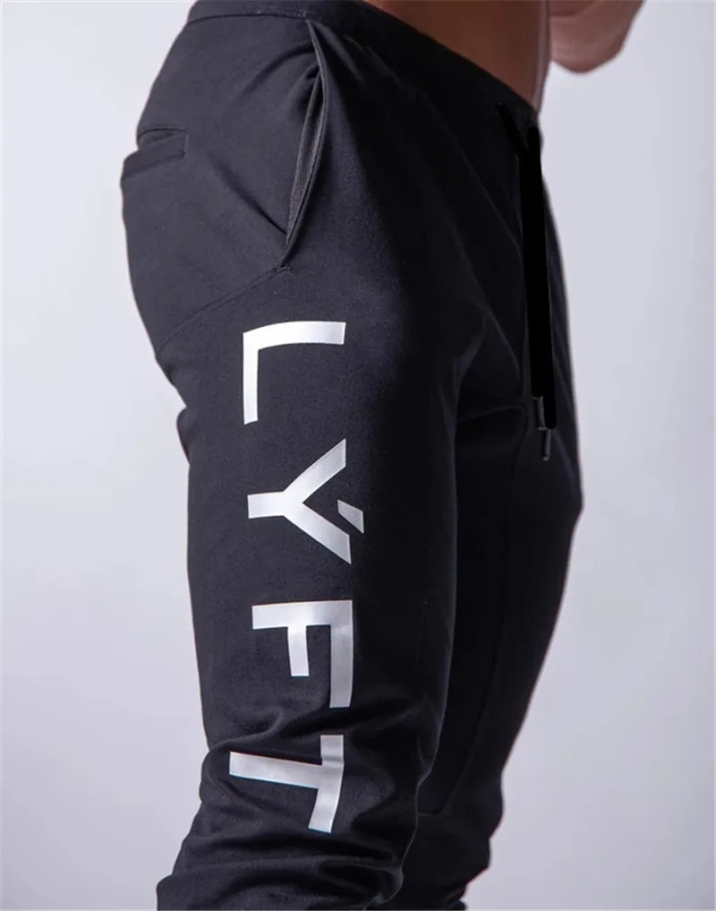 2021 New Jogging Men Sport Sweatpants Running Pants GYM Pants Men Joggers Cotton Trackpants Slim Fit Pants Bodybuilding Trouser 
2021 New Jogging Men Sport Sweatpants Running Pants GYM Pants Men Joggers Cotton Trackpants Slim Fit Pants Bodybuilding Trouser