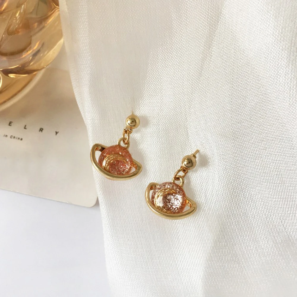Han Edition Contracted Star earring Personality Small Drip Saturn earrings With Pink Star Earrings Women Jewelry Gifts
Han Edition Contracted Star earring Personality Small Drip Saturn earrings With Pink Star Earrings Women Jewelry Gifts