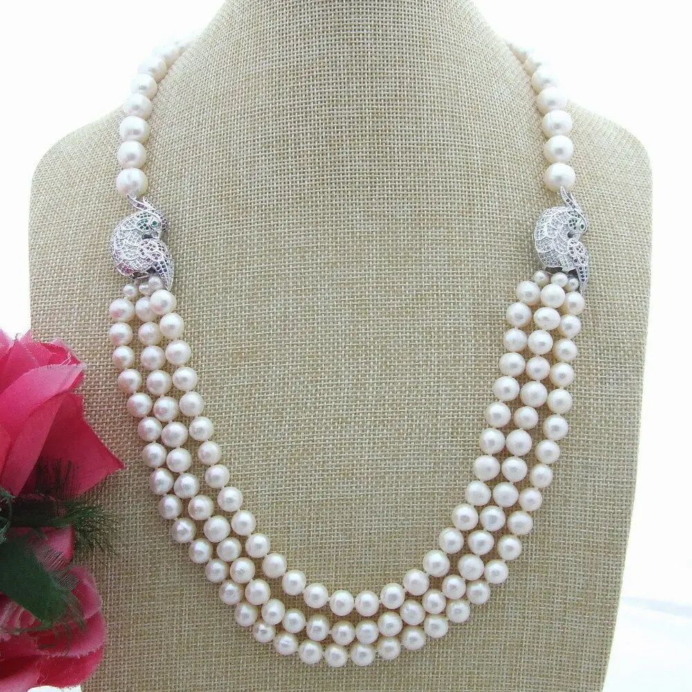 Fashion statement natural white freshwater pearl necklace zircon bird accessories clasp 63-68cm long
Fashion statement natural white freshwater pearl necklace zircon bird accessories clasp 63-68cm long