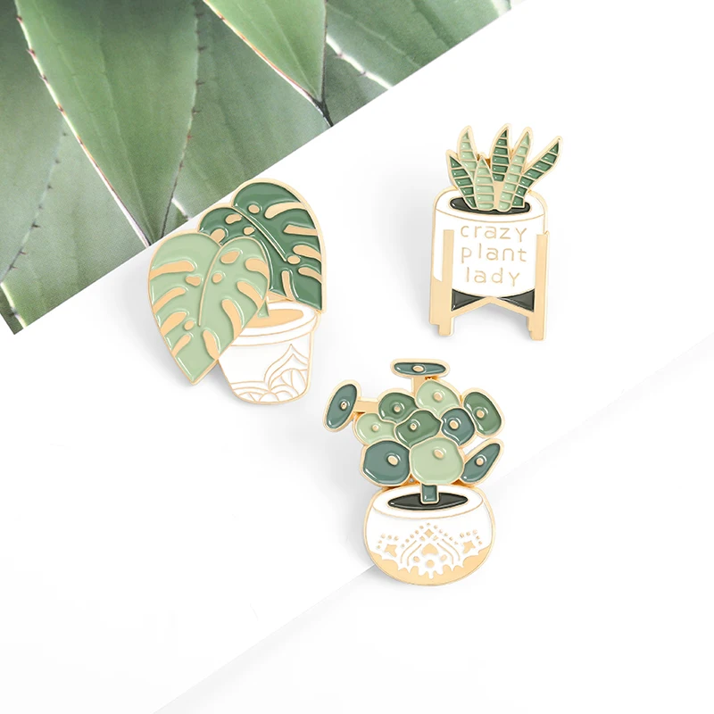 

QIHE Jewelry Crazy Potted Plants Enamel Pins Monstera Sansevieria Brooches Badges Plant Lady Pin Gifts for Friends Wholesale