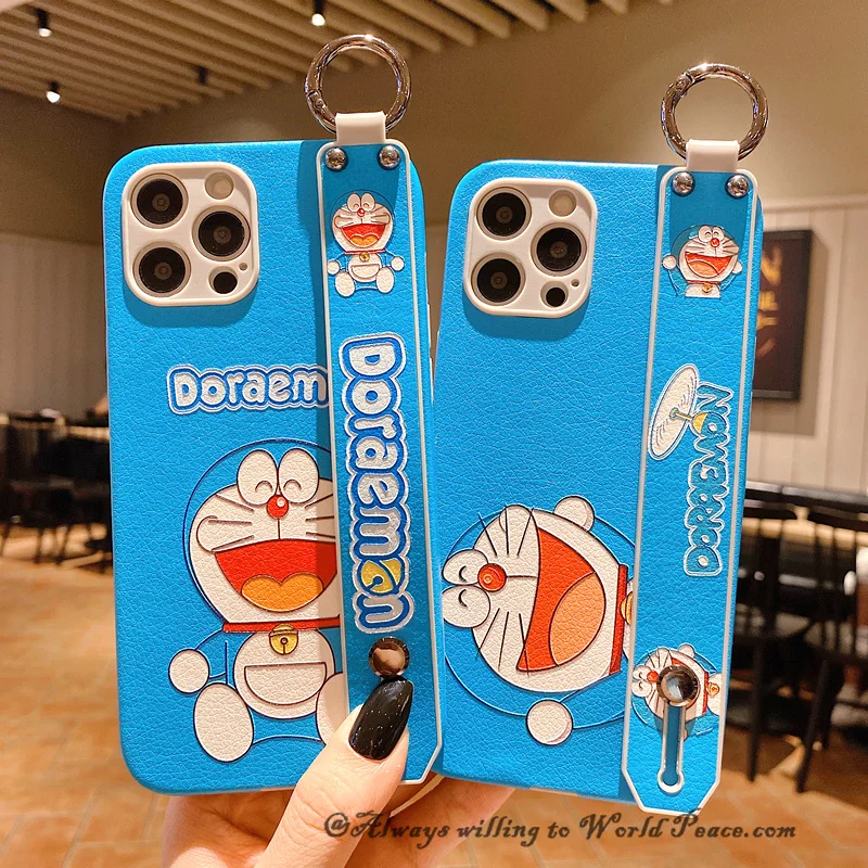 Doraemon cartoon cute wrist strap bracket couple mobile phone case for iPhone se2//8p/xs/xsmax/xr/11promax/12/12promax/12mini 
Doraemon cartoon cute wrist strap bracket couple mobile phone case for iPhone se2//8p/xs/xsmax/xr/11promax/12/12promax/12mini