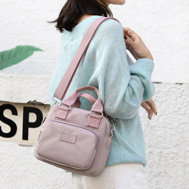 2022 New Fashion Messenger Bag Women Shoulder Bag Nylon Handbag Large Capacity Small Fresh Women's Tote Shopping Bag 
2022 New Fashion Messenger Bag Women Shoulder Bag Nylon Handbag Large Capacity Small Fresh Women's Tote Shopping Bag