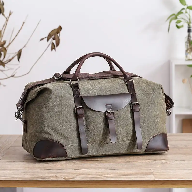 Canvas travel bag portable travel bag large-capacity waterproof foldable luggage bag men's travel bag on business
Canvas travel bag portable travel bag large-capacity waterproof foldable luggage bag men's travel bag on business