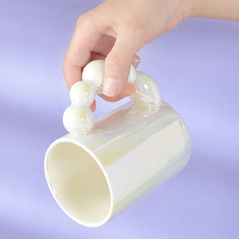 Creative Handmade Ceramic Mug Nordic Coffee Mug Rotating Ball Handle Milk Tea Cups Drinkware Kitchen Home Decor Unique Gifts
Creative Handmade Ceramic Mug Nordic Coffee Mug Rotating Ball Handle Milk Tea Cups Drinkware Kitchen Home Decor Unique Gifts