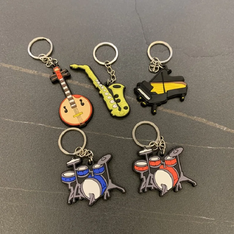 Musical Instrument Silicone Keychain Violin Saxophone Guitar Piano Key Ring Student School Bag Backpack Small Pendant
Musical Instrument Silicone Keychain Violin Saxophone Guitar Piano Key Ring Student School Bag Backpack Small Pendant