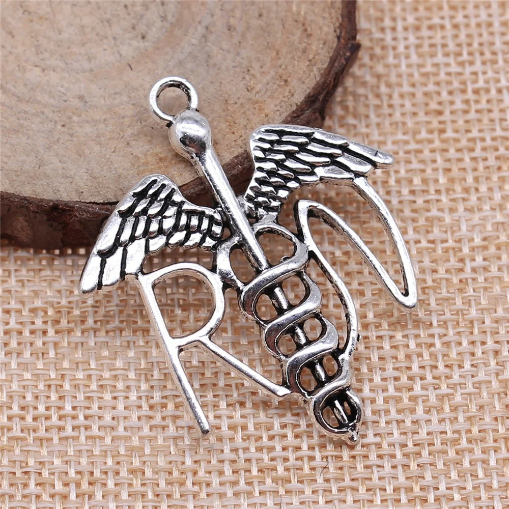 13pcs 44x37mm antique silver RN walking stick medical symbol charms diy retro jewelry fit Earring keychain hair card pendant
13pcs 44x37mm antique silver RN walking stick medical symbol charms diy retro jewelry fit Earring keychain hair card pendant