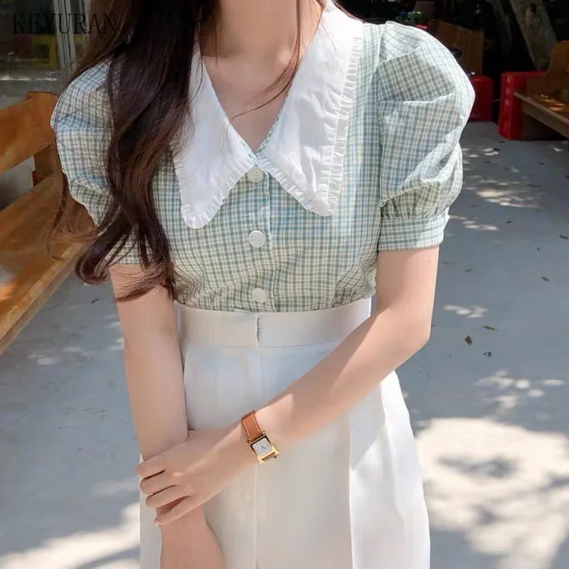 Винтажная клетчатая однобортная рубашка в стиле ретро, женские топы, летние женские блузки с пышными рукавами, женские блузки, Корейская ши... 
Винтажная клетчатая однобортная рубашка в стиле ретро, женские топы, летние женские блузки с пышными рукавами, женские блузки, Корейская ши...