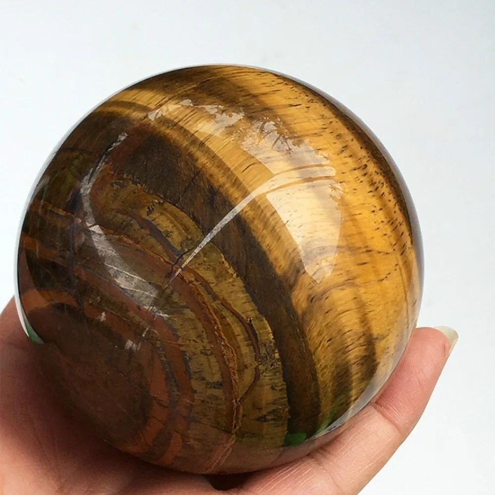500g Natural Tiger Eye Stone Crystal Ball Quartz Sphere Ball Crystal Ornament Craft
500g Natural Tiger Eye Stone Crystal Ball Quartz Sphere Ball Crystal Ornament Craft