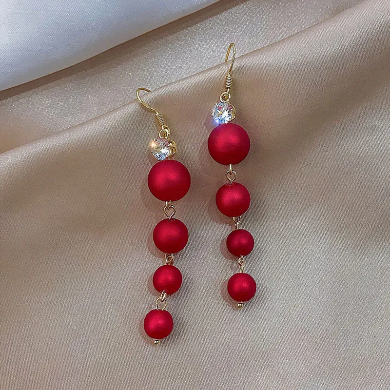 2021 New Trend Imitation Pearl Tassel Earrings Women's Fashion Long Earrings red Round Pearl Pendant Earrings Wedding Jewelry
2021 New Trend Imitation Pearl Tassel Earrings Women's Fashion Long Earrings red Round Pearl Pendant Earrings Wedding Jewelry
