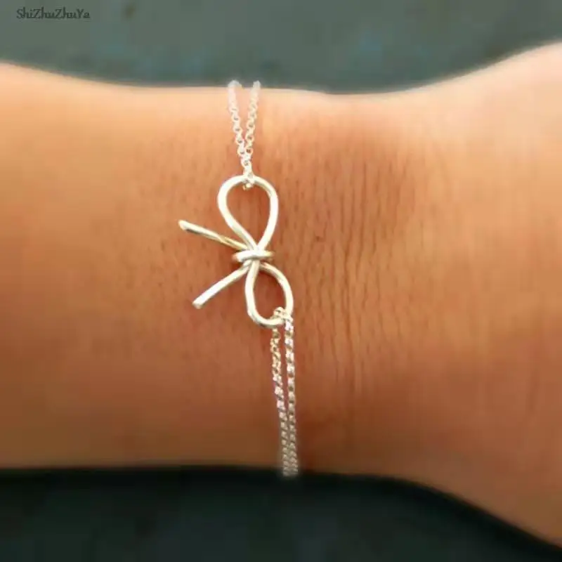The new bow knot double-layer bracelet simple temperament exquisite personality metal chain ladies party fashion jewelry
The new bow knot double-layer bracelet simple temperament exquisite personality metal chain ladies party fashion jewelry