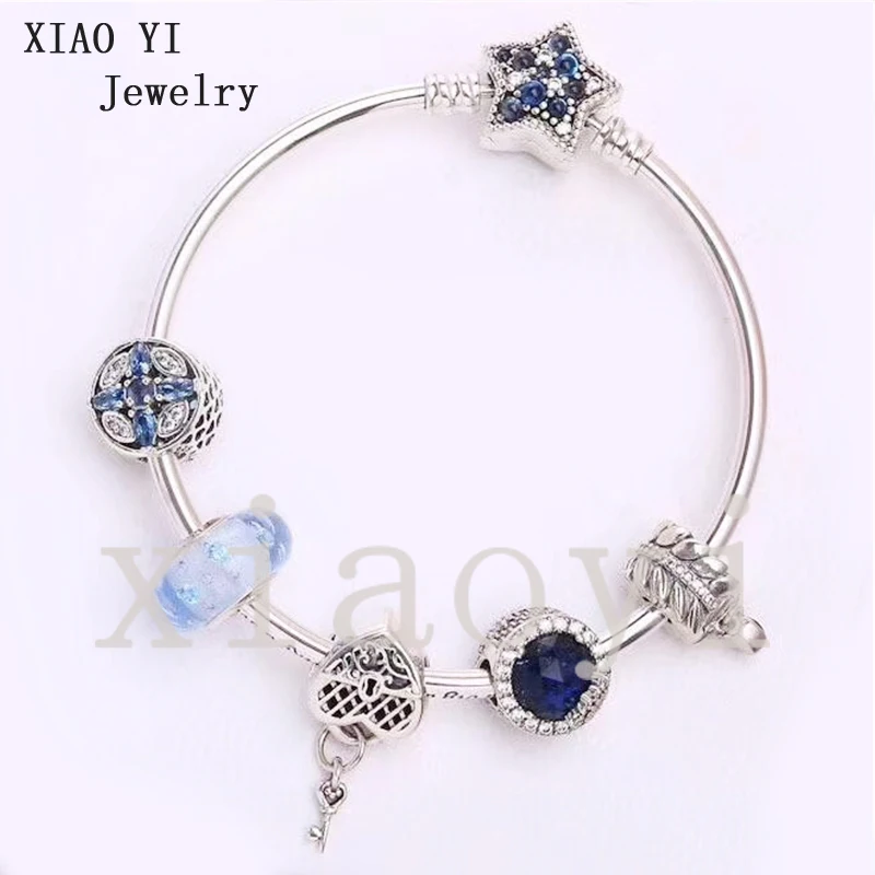 XIAOYI 2020 New 100% S925 Blue heart keys cat eyes Wheat ears stars wedding party fashion DIY fine jewelry birthday gift female
XIAOYI 2020 New 100% S925 Blue heart keys cat eyes Wheat ears stars wedding party fashion DIY fine jewelry birthday gift female