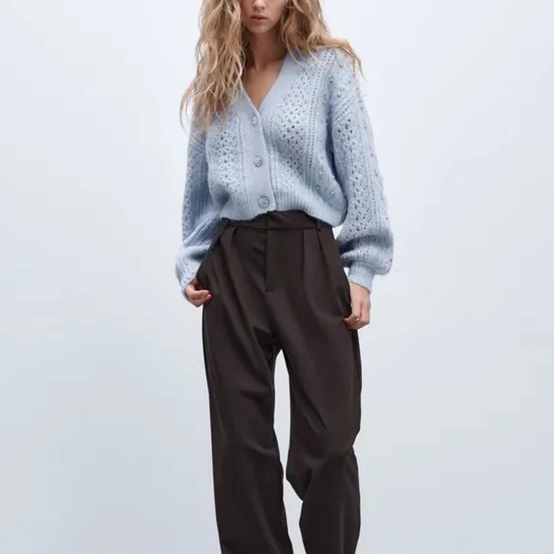 Spring and autumn women's casual solid color V-neck long-sleeved beaded cardigan sweater
Spring and autumn women's casual solid color V-neck long-sleeved beaded cardigan sweater