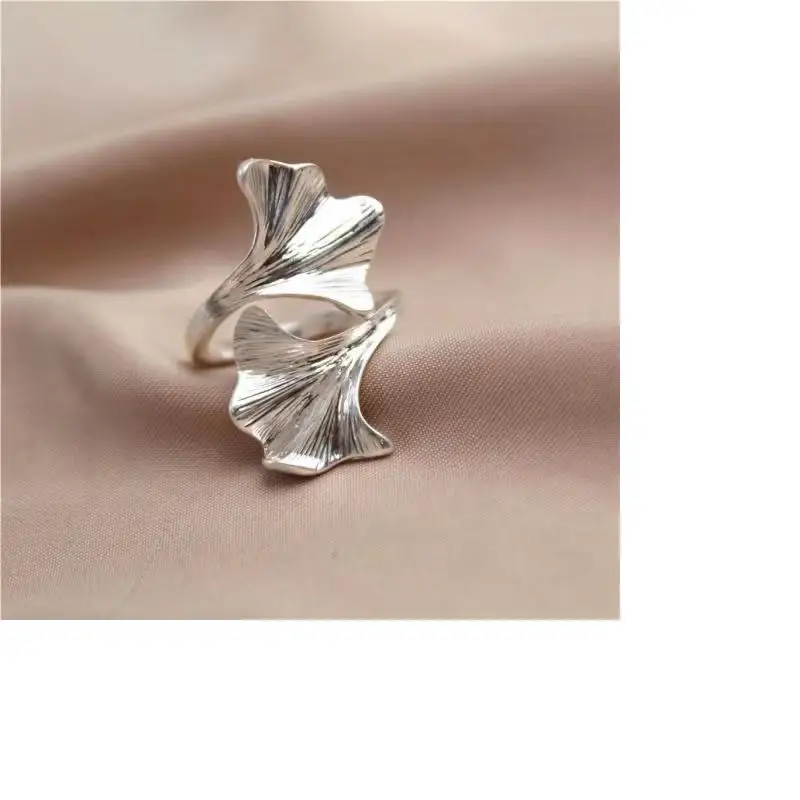 New Ring Silver Ginkgo leaf modeling fashion personality simple fashion woman ring, inside diameter 17 mm
New Ring Silver Ginkgo leaf modeling fashion personality simple fashion woman ring, inside diameter 17 mm