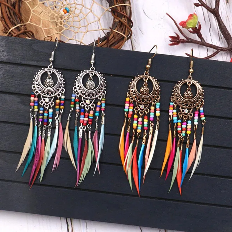 Feather Earrings With Bohemian Vintage Hollowed-Out Oval Colorful Beaded Rice Tassel Fashion Jewelry For Women
Feather Earrings With Bohemian Vintage Hollowed-Out Oval Colorful Beaded Rice Tassel Fashion Jewelry For Women