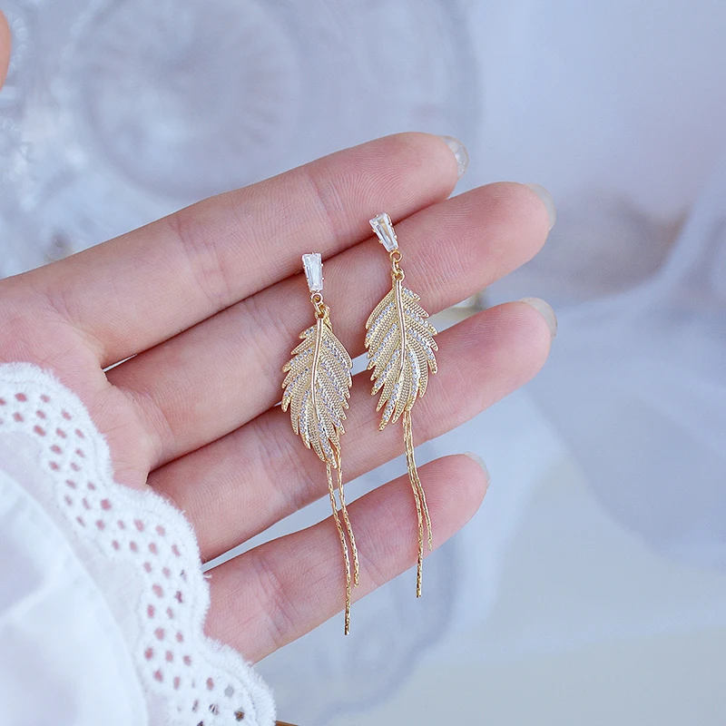 New Popular Design Leaves Tassel Drop Earrings for Women Girl High Quality Jewelry S925 Needle Shiny AAA Zircon Party Fine Gift
New Popular Design Leaves Tassel Drop Earrings for Women Girl High Quality Jewelry S925 Needle Shiny AAA Zircon Party Fine Gift