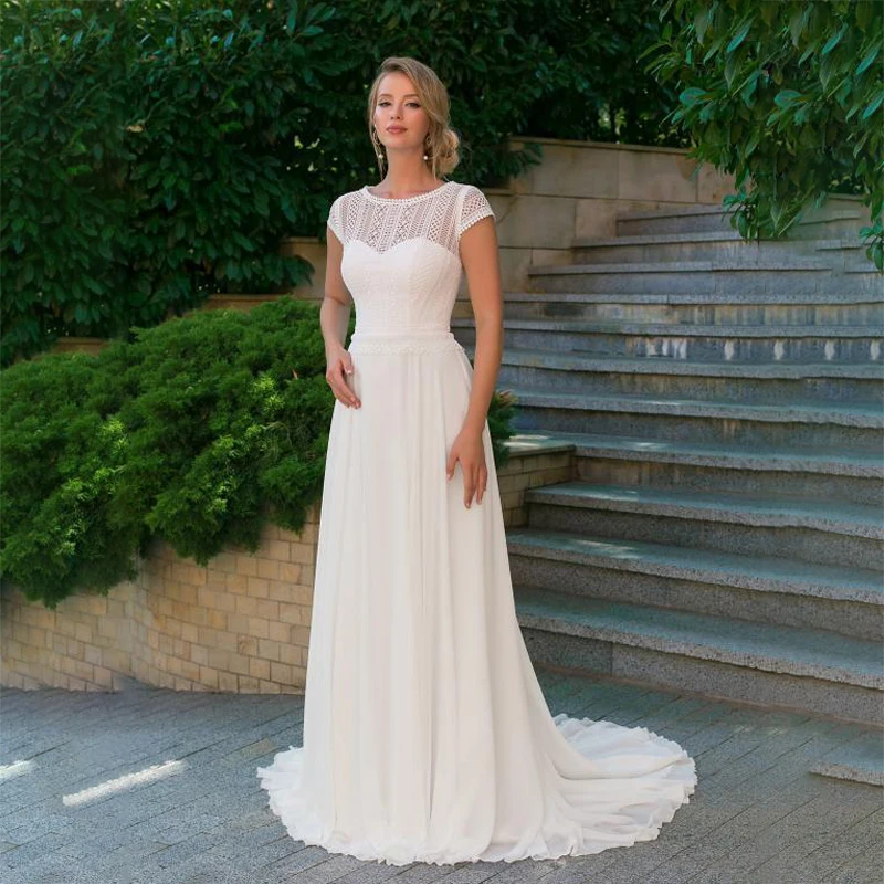 Fashion Lace Chiffon Wedding Dresses 2021 Scoop Backless Beach Short Sleeve Bride Dresses Cap Sleeve Sweep Train
Fashion Lace Chiffon Wedding Dresses 2021 Scoop Backless Beach Short Sleeve Bride Dresses Cap Sleeve Sweep Train