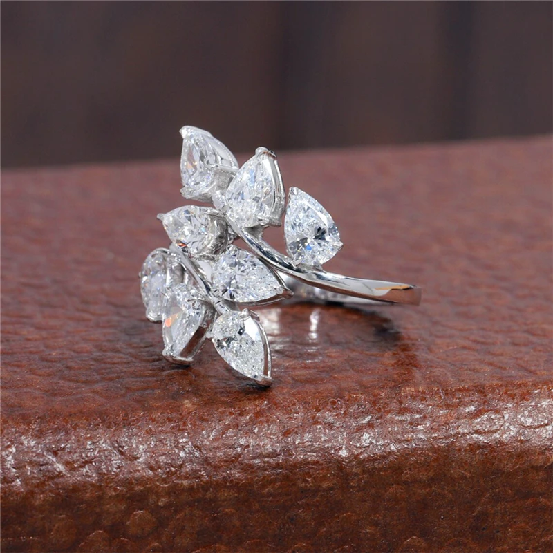 RandH Solid 14K White Gold Pear 5*3mm Cut Flower Moissante Rings Luxury Art Deco Twig Leaf Rings For Women Party Fashion Ring
RandH Solid 14K White Gold Pear 5*3mm Cut Flower Moissante Rings Luxury Art Deco Twig Leaf Rings For Women Party Fashion Ring