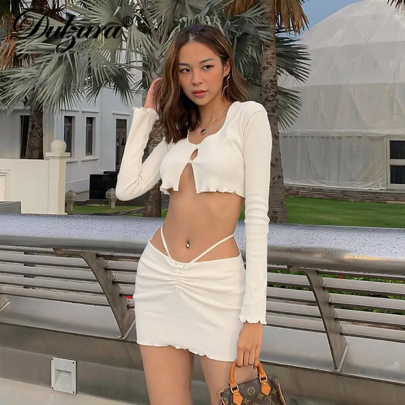 Women's suit solid color cross tie long-sleeved shirt with pleated hip skirt two-piece all-match hot girl suit
Women's suit solid color cross tie long-sleeved shirt with pleated hip skirt two-piece all-match hot girl suit