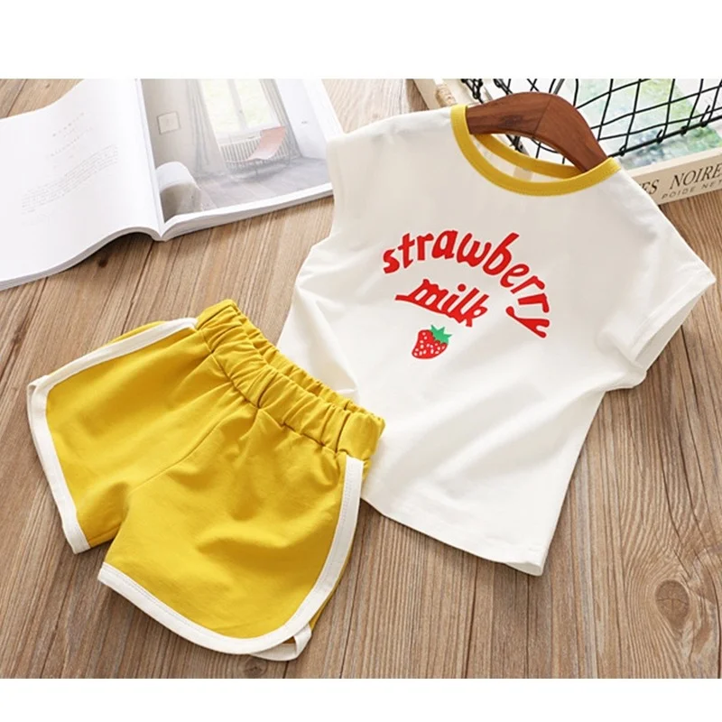 Summer Short Sleeve Outfit Kids Babys Strawberry Print 2pcs Set Girl Cute Round Neck Tops Pants T-shirt Shorts Children Outfits
Summer Short Sleeve Outfit Kids Babys Strawberry Print 2pcs Set Girl Cute Round Neck Tops Pants T-shirt Shorts Children Outfits
