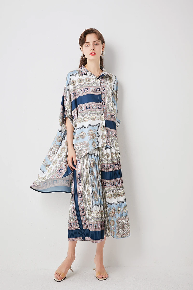 New 2021 European style fasshion two-piece set latest design bat sleeve irregular shirt + pleated wide-leg pants
New 2021 European style fasshion two-piece set latest design bat sleeve irregular shirt + pleated wide-leg pants