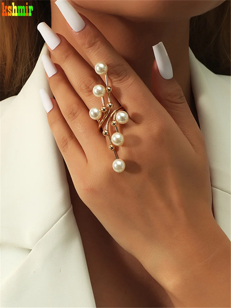 kshmir Fashion trend pearl geometric ring metallic gold exaggerated female opening can be resized ring jewelry gifts 2021
kshmir Fashion trend pearl geometric ring metallic gold exaggerated female opening can be resized ring jewelry gifts 2021