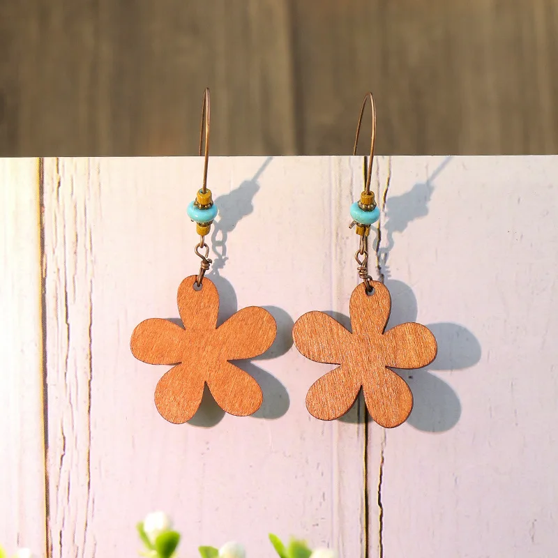Fashion Women Vintage Boho Flower Leaf Drop Wood Earrings Turquoise Bead Bow Hanging Geometry Teardrop Hollow Out Wooden Jewelry
Fashion Women Vintage Boho Flower Leaf Drop Wood Earrings Turquoise Bead Bow Hanging Geometry Teardrop Hollow Out Wooden Jewelry