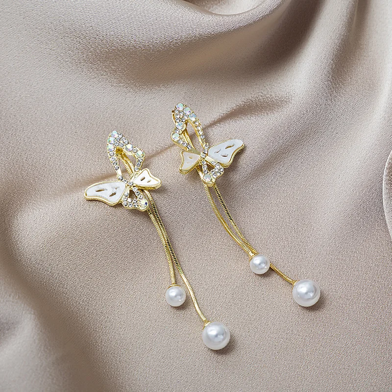 Длинные темпераментные серьги-бабочки в Корейском стиле с кисточками для женщин и девушек с жемчугом элегантные высококачественные модные...
Длинные темпераментные серьги-бабочки в Корейском стиле с кисточками для женщин и девушек с жемчугом элегантные высококачественные модные...