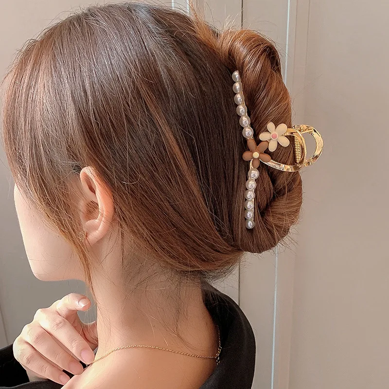 Sense of metal hair clip female summer large back head hairpin temperament plate hair shark clip French net red hairpin
Sense of metal hair clip female summer large back head hairpin temperament plate hair shark clip French net red hairpin