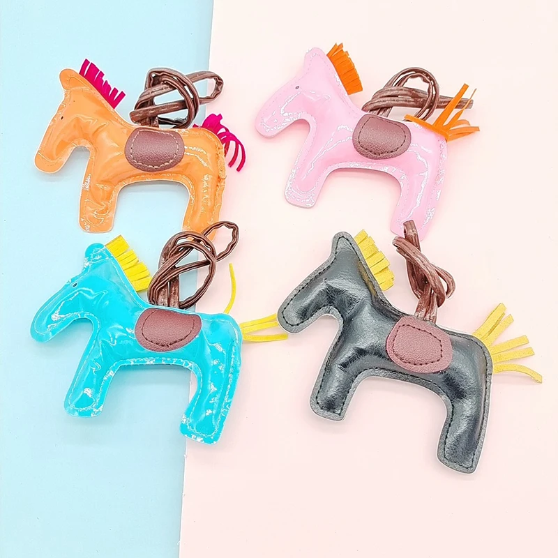 Colorful PU Leather Horse Shape Hanger Keychain Color Pendant Decoration For Ladies Bag Charm Accessories Ornament Gifts
Colorful PU Leather Horse Shape Hanger Keychain Color Pendant Decoration For Ladies Bag Charm Accessories Ornament Gifts