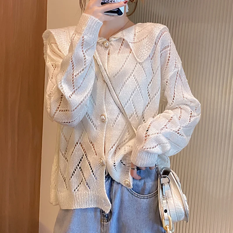 Baby collar sweater cardigan Korean jacket long sleeve autumn dress 2021 new female winter sweater lazy style
Baby collar sweater cardigan Korean jacket long sleeve autumn dress 2021 new female winter sweater lazy style