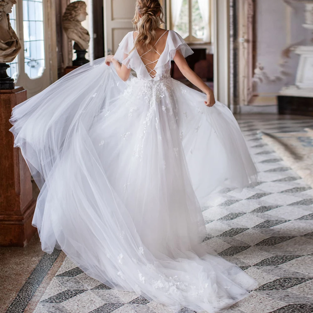 Vestidos Sexy Wedding Dresses Organza Illusion Appliques V-Neck Short Sleeve Backless A-Line Bridal Gowns Novia Do 
Vestidos Sexy Wedding Dresses Organza Illusion Appliques V-Neck Short Sleeve Backless A-Line Bridal Gowns Novia Do