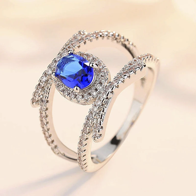 MFY Fashion X-shaped Double Row Bifurcated Zircon Blue Crystal Ring For Wome Hollow Temperament Ladies Banquet Party Ring
MFY Fashion X-shaped Double Row Bifurcated Zircon Blue Crystal Ring For Wome Hollow Temperament Ladies Banquet Party Ring