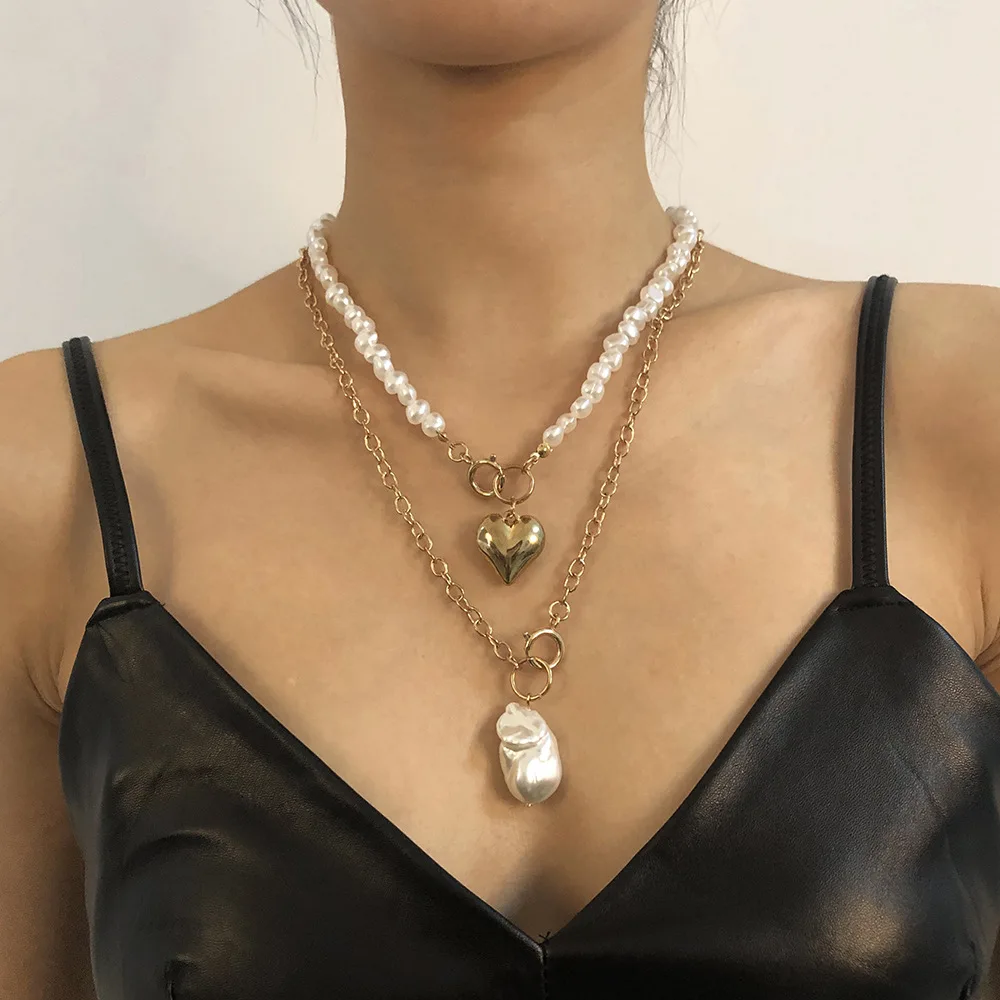 2021 European and American style necklace modern trend imitation pearl double clavicle chain creative love geometric Necklace
2021 European and American style necklace modern trend imitation pearl double clavicle chain creative love geometric Necklace