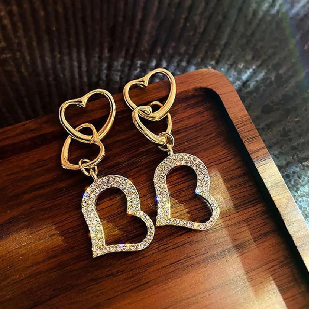 4.5*1.5cm Korean Simple Peach Heart Dangle Earrings Gold Rhinestone Filled Luxury Temperament for Women Modern Party Jewelry RU8
4.5*1.5cm Korean Simple Peach Heart Dangle Earrings Gold Rhinestone Filled Luxury Temperament for Women Modern Party Jewelry RU8