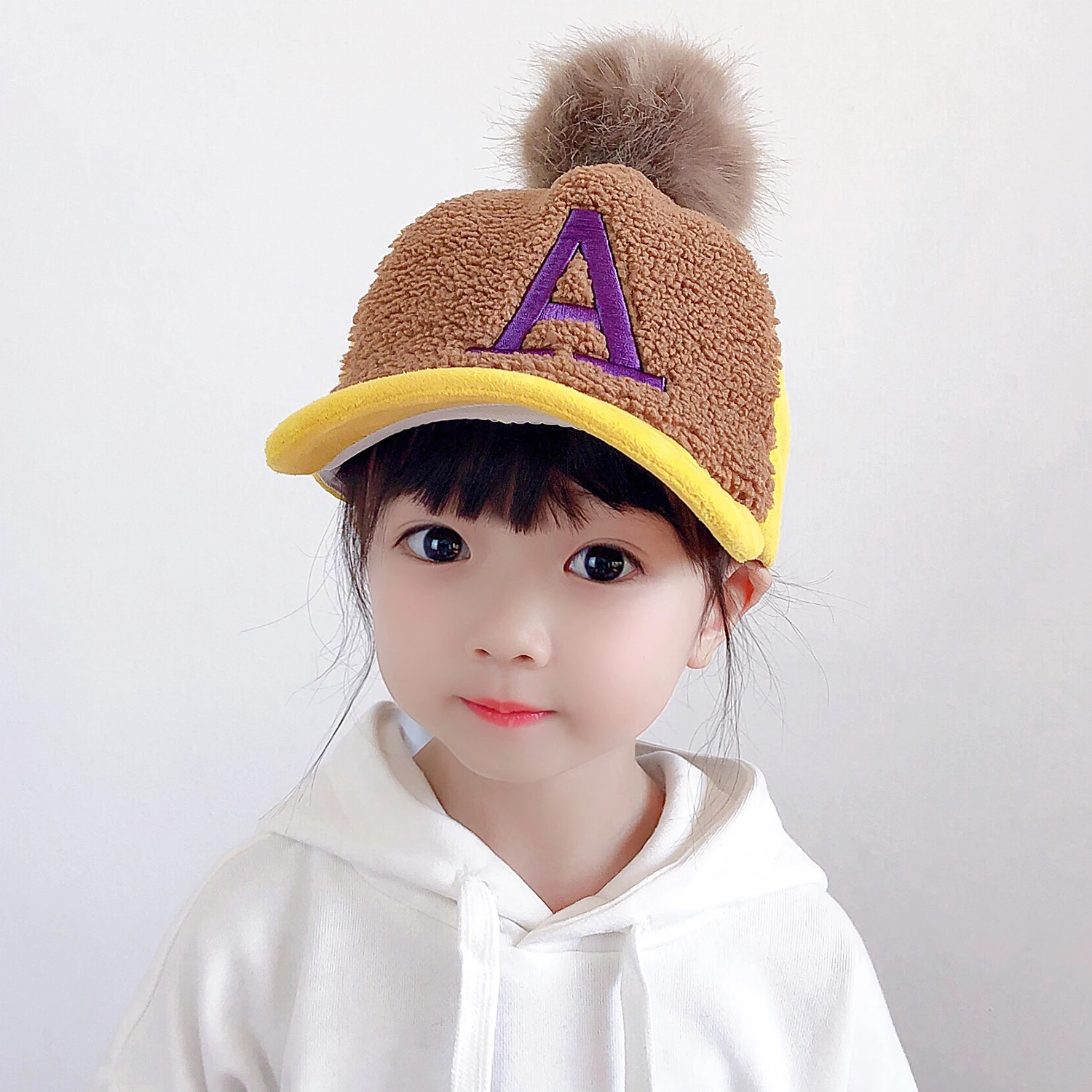 Fashion Child Cartoon Letter A Cap Autumn Winter Hip Hop Hat With Big Fur Ball Pompon Baseball Cap Warm Soft Ball Peaked Caps
Fashion Child Cartoon Letter A Cap Autumn Winter Hip Hop Hat With Big Fur Ball Pompon Baseball Cap Warm Soft Ball Peaked Caps