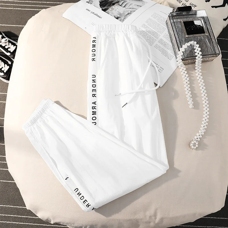 Women Ice Silk Casual Pants Hollow Loose Street Sports Nine-Length Pants Quick-Drying Letter Printing Spring Autumn Clothes
Women Ice Silk Casual Pants Hollow Loose Street Sports Nine-Length Pants Quick-Drying Letter Printing Spring Autumn Clothes