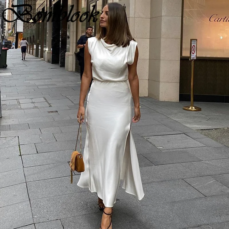 Bomblook Casual Fashion Women's Suit Summer 2021 O-neck Solid Sleeveless Top Loose Midi Skirt Set Vetement Femme Streerwears
Bomblook Casual Fashion Women's Suit Summer 2021 O-neck Solid Sleeveless Top Loose Midi Skirt Set Vetement Femme Streerwears