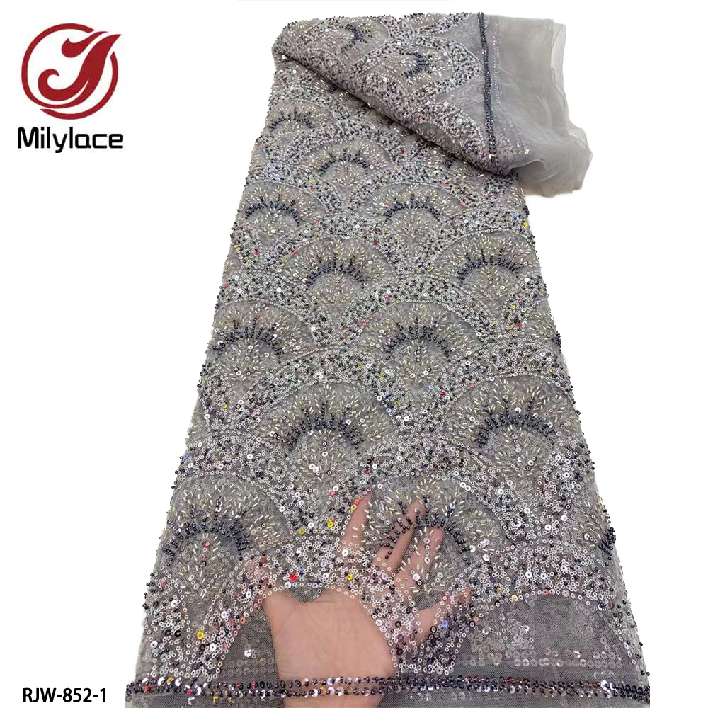 Luxury Heavy Bead Wedding Bridal Gown Lace Fabric Tulle Embroidery Lace Fabric with Sequins for Party Dress RJW-852
Luxury Heavy Bead Wedding Bridal Gown Lace Fabric Tulle Embroidery Lace Fabric with Sequins for Party Dress RJW-852