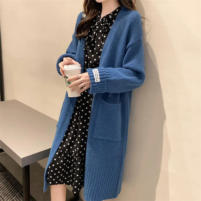 2021 lazy wind sweater women's coat long Korean version over the knee loose outer v-neck plain color cardigan women's tide
2021 lazy wind sweater women's coat long Korean version over the knee loose outer v-neck plain color cardigan women's tide