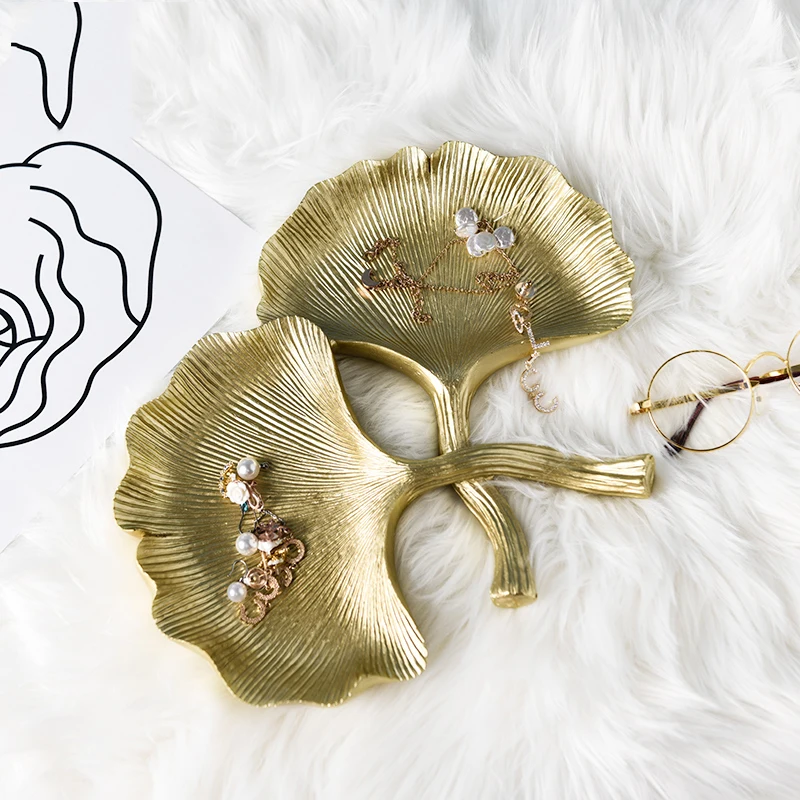 Nordic Ginkgo Leaf Shape Gold Plate Jewelry Snack Storage tray Resin Ornaments Home Livingroom Desk Figurines Decoration Crafts
Nordic Ginkgo Leaf Shape Gold Plate Jewelry Snack Storage tray Resin Ornaments Home Livingroom Desk Figurines Decoration Crafts
