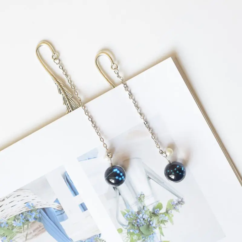 Creative Noctilucent 12 Constellation Bookmark Pendant Metal Book Marker Stationery School Office Supplies 
Creative Noctilucent 12 Constellation Bookmark Pendant Metal Book Marker Stationery School Office Supplies