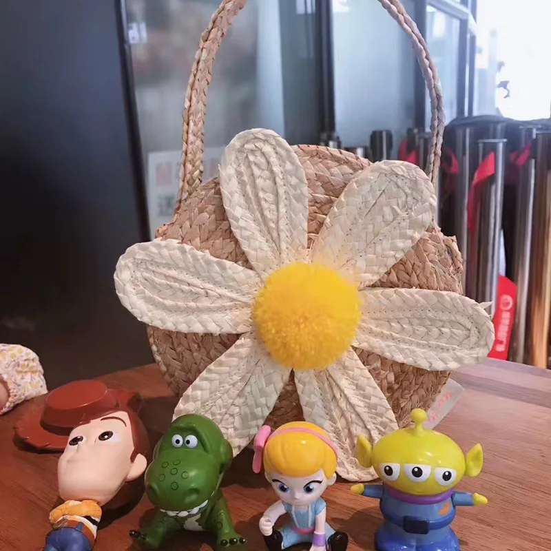 Wind daisy flower bag straw woven bag hand-woven hand bag cute one-shoulder small satchel
Wind daisy flower bag straw woven bag hand-woven hand bag cute one-shoulder small satchel