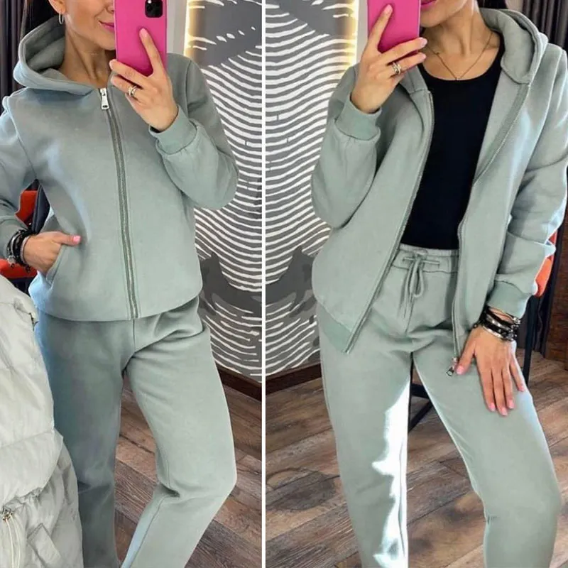 2021 new sweater suit fashion solid color hooded zipper top plus pants sports suit autumn and winter women's leisure
2021 new sweater suit fashion solid color hooded zipper top plus pants sports suit autumn and winter women's leisure