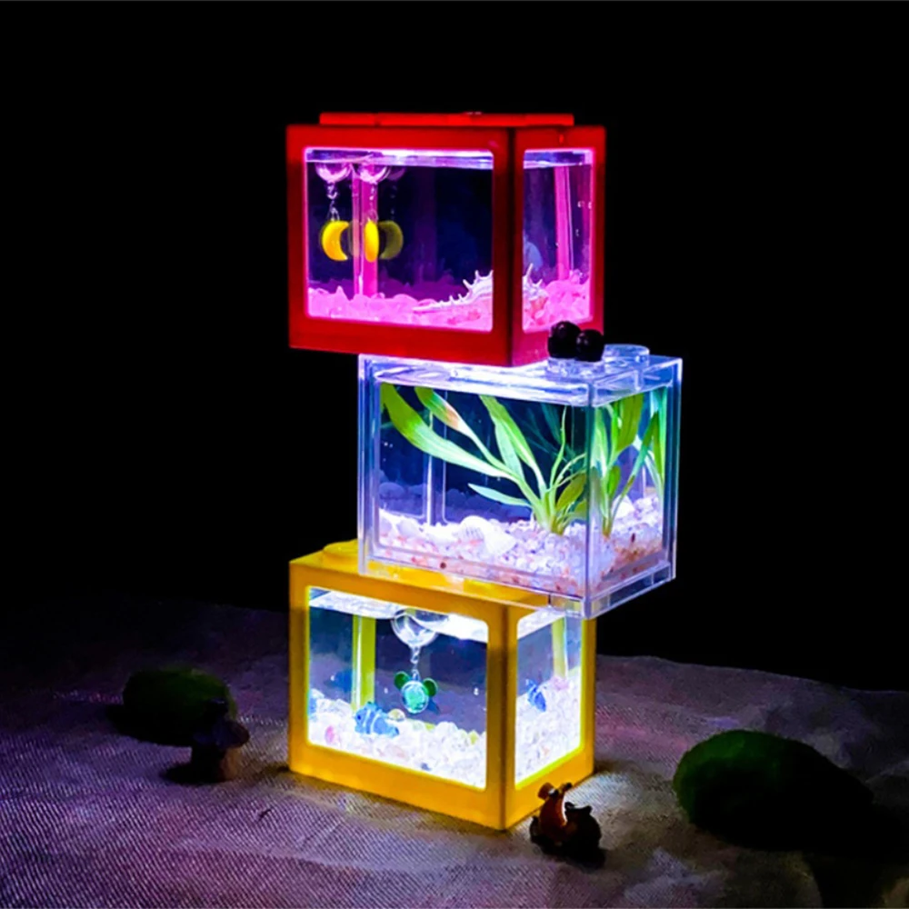 Mini Fish Tank Reptile Pet Box Stackable Aquarium Creative Building Block Fish Cylinder Landscape Seaweed for Office Decoration
Mini Fish Tank Reptile Pet Box Stackable Aquarium Creative Building Block Fish Cylinder Landscape Seaweed for Office Decoration