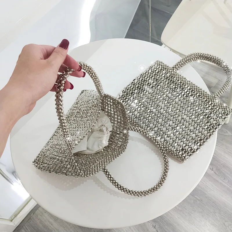 Retro Metal Women's bag Handmade Beaded Luxury Designer Handbag Shiny Bags 2021 Women's Brand High Quality Shopper Bag Z229
Retro Metal Women's bag Handmade Beaded Luxury Designer Handbag Shiny Bags 2021 Women's Brand High Quality Shopper Bag Z229