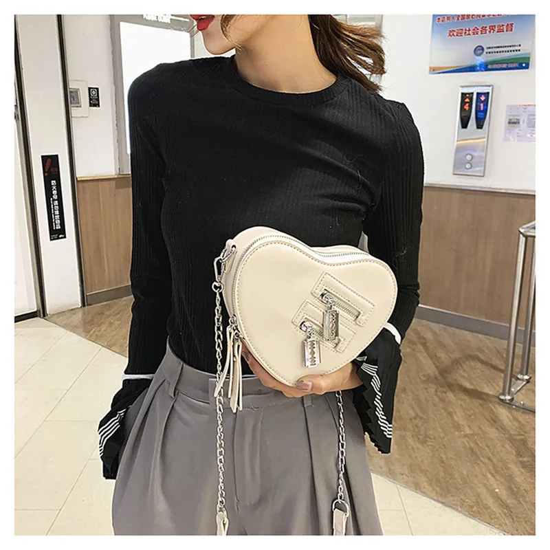 New 2021 Chain Fashion Love Bag For Women Blade Metal Shoulder Messenger Bag Black PU Leather Summer Simplicity Cute Bag Female
New 2021 Chain Fashion Love Bag For Women Blade Metal Shoulder Messenger Bag Black PU Leather Summer Simplicity Cute Bag Female