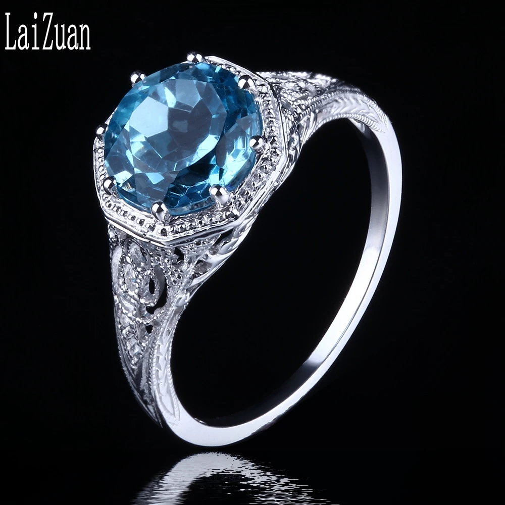 

Женское кольцо из белого золота, 8 мм, с натуральным голубым топазом