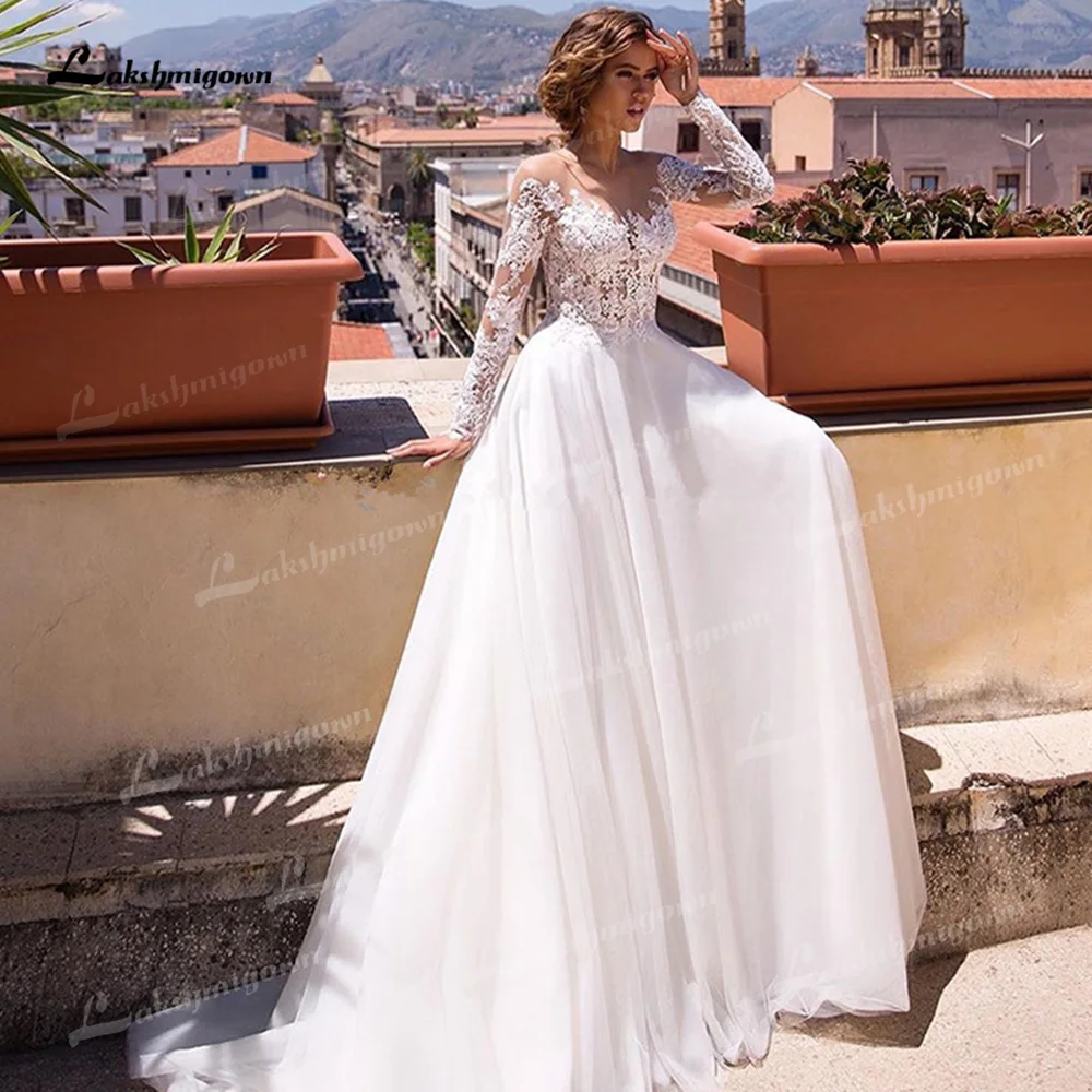 Bohemian Tulle A-Line Wedding Dresses Sexy V-Neck Long Sleeve Sweep/Brush Train Bride Gowns Appliques Lace Vestidos De Novia 
Bohemian Tulle A-Line Wedding Dresses Sexy V-Neck Long Sleeve Sweep/Brush Train Bride Gowns Appliques Lace Vestidos De Novia