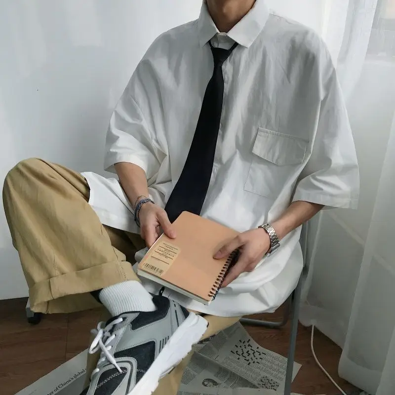 Summer Business Casual Shirt Mens Korean Fashion Loose Solid Color Tooling Shirt Men Harajuku Streetwear Five-point Sleeve Shirt
Summer Business Casual Shirt Mens Korean Fashion Loose Solid Color Tooling Shirt Men Harajuku Streetwear Five-point Sleeve Shirt