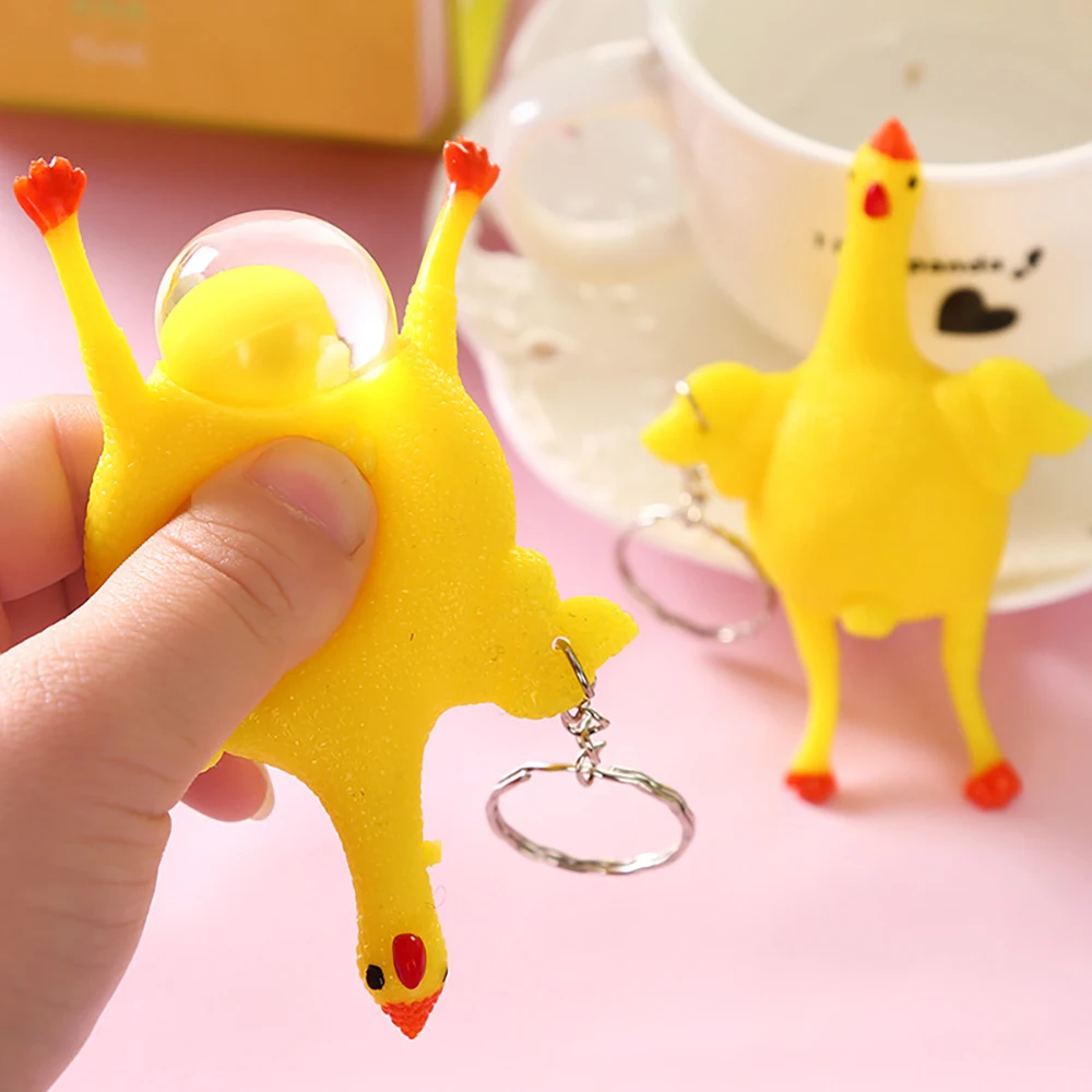 

Cute Chicken Egg Laying Funny Spoof Tricky Key Chains Chicken Keyring Toys Pinch Gadgets Squeeze Layer Decompression Gift